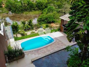 Bazén v ubytování Casa em Guarapari próx da praia nebo v jeho okolí