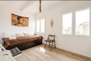 A bed or beds in a room at Apartamento Alma de Mar, increíble vistas!!