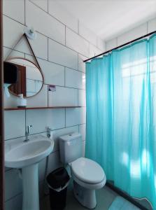 a bathroom with a sink and a toilet and a shower at Casa Monjardim in Vitória +64 photos