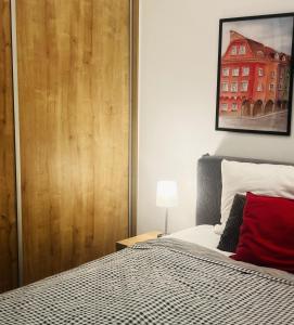Posteľ alebo postele v izbe v ubytovaní Apartamenty Wierzbowa 5