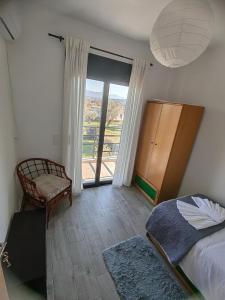 Postel nebo postele na pokoji v ubytování Villa Maximos