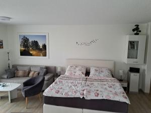 Ένα ή περισσότερα κρεβάτια σε δωμάτιο στο Ferienwohnung Sonnenschein