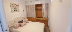 Ένα ή περισσότερα κρεβάτια σε δωμάτιο στο Vistas aloha playa apartamento +24 φωτογραφίες