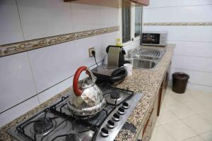 Η κουζίνα ή μικρή κουζίνα στο Le petit prince D'agadir +11 φωτογραφίες