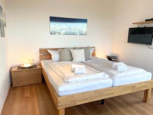 Ένα ή περισσότερα κρεβάτια σε δωμάτιο στο Apartmenthaus Frauenpreiss FeWo 307 +17 φωτογραφίες