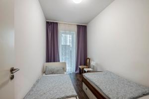 Postel nebo postele na pokoji v ubytování Ferienwohnung Alex
