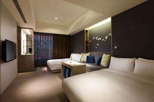 TV o dispositivi per l'intrattenimento presso 礁溪晶泉丰旅 Wellspring by Silks Jiaoxi