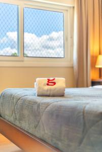 Cama ou camas em um quarto em Morada do Sol 302 - Apto novo em Gramado