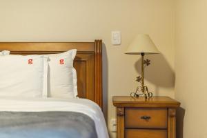 Cama ou camas em um quarto em Morada do Sol 302 - Apto novo em Gramado