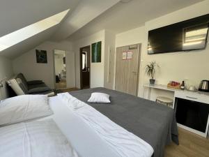 Letto o letti in una camera di Gostisce Sovdat