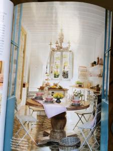 a dining room with a table and chairs at Villa Station by Cassai in Ses Salines