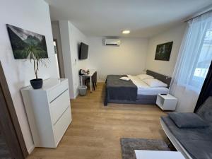 Letto o letti in una camera di Gostisce Sovdat