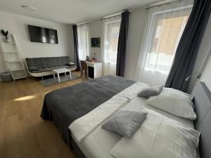 Letto o letti in una camera di Gostisce Sovdat