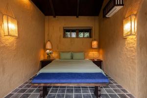 Кровать или кровати в номере Cháy Mountain Retreat Ninh Bình