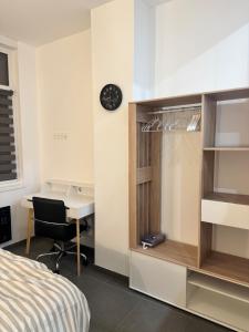 Ένα ή περισσότερα κρεβάτια σε δωμάτιο στο Apartment Lille-Fives
