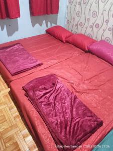Postel nebo postele na pokoji v ubytování Blessed Homestay