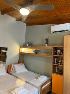 A bed or beds in a room at Eirinis House