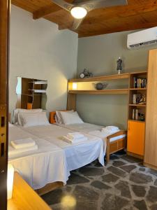 A bed or beds in a room at Eirinis House