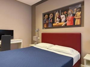 Giường trong phòng chung tại Delano Rooms