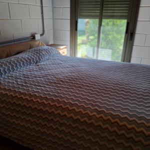 Postel nebo postele na pokoji v ubytování Departamento Interno, Barrio Universidad