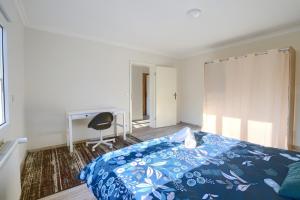 Postel nebo postele na pokoji v ubytování Maison 8 pers et 2 lits bébés + 1 fotografie
