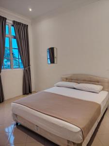 Ένα ή περισσότερα κρεβάτια σε δωμάτιο στο Pearl Villa 5 Bedroom Unit 3A