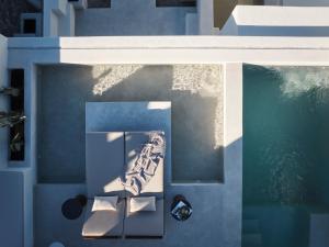 a view from above of a swimming pool with aqualivist at Ark in Pirgos