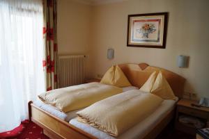 Katil atau katil-katil dalam bilik di Hotel Wechselberger by Alpeffect Hotels