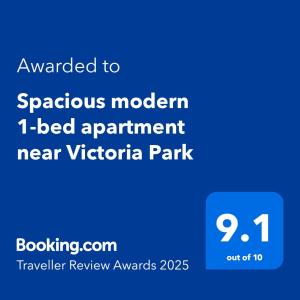 a screenshot of a park sign with the text upgraded to spontaneous modern bed apartment at Spacious modern 1-bed apartment near Victoria Park & London Stadium in London