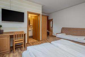 Postel nebo postele na pokoji v ubytování Hotel Franco
