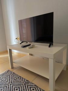 Un televizor și/sau centru de divertisment la Cozy apartment 3