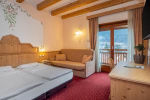 Postel nebo postele na pokoji v ubytování Hotel Franco