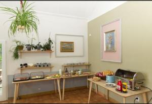 a room with two tables with food on them at RS U Kapličky in Jindřichŭv Hradec +5 photos