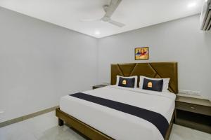Postel nebo postele na pokoji v ubytování Hotel O D Suites