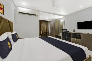 Postel nebo postele na pokoji v ubytování Hotel O D Suites
