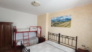 A bed or beds in a room at B&B Itufi