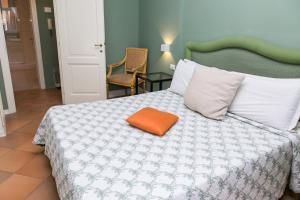 Posteľ alebo postele v izbe v ubytovaní Rasella Suites 47