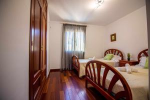 Łóżko lub łóżka w pokoju w obiekcie Villa Cañada torremolinos