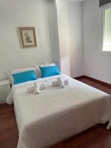 Łóżko lub łóżka w pokoju w obiekcie Villa Cañada torremolinos