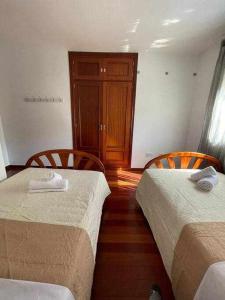 Łóżko lub łóżka w pokoju w obiekcie Villa Cañada torremolinos