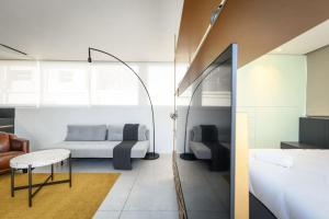 Χώρος καθιστικού στο Modern Studio Apt with Balcony by Sea N Rent