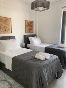 Una cama o camas en una habitación de Elenka Seaview