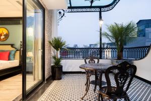 Balkón nebo terasa v ubytování Hanoi Bliss Hotel