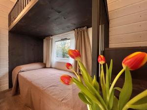 Postel nebo postele na pokoji v ubytování Camping Campo dei Fiori