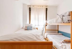 Vuode tai vuoteita majoituspaikassa Casa Dora Puzol