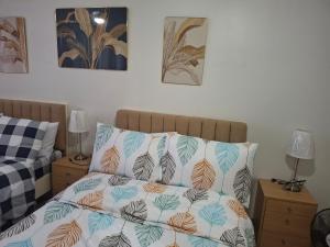 Ένα ή περισσότερα κρεβάτια σε δωμάτιο στο Simplicity +1 φωτογραφίες