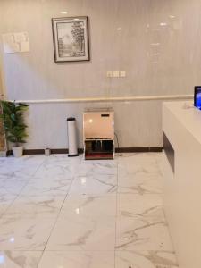 TV a/nebo společenská místnost v ubytování دلة الفال للشقق المخدومة