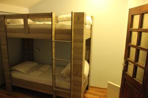 Ένα ή περισσότερα κρεβάτια σε δωμάτιο στο Pick me HOSTEL