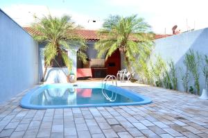 Foto de INTEIRO com 3 SUITES E PISCINA