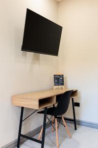 TV in/ali zabaviščno središče v nastanitvi Habitación-Exclusiva-Cómoda-Centrica